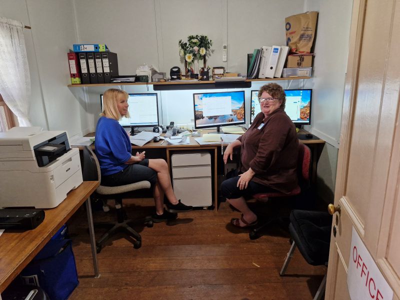 Deb and Nannette in the office